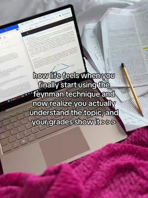 The image shows a laptop open on a bed. Text overlays are present. Papers and a pencil are on the right.