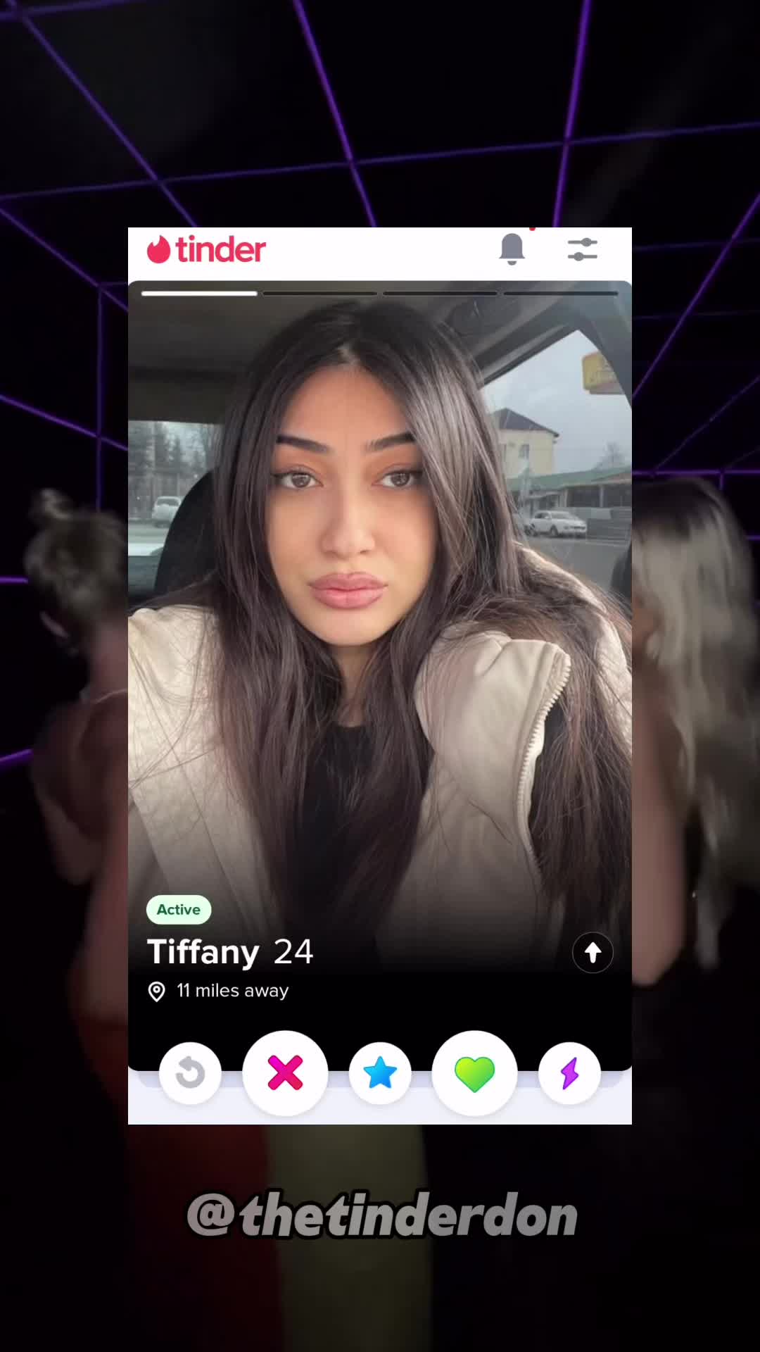 The cover image is a vertical shot of a woman's Tinder profile on a phone display. The foreground shows the interface: the Tinder logo at the top, the woman's photo prominently displayed. Below the photo is profile data like name and age (Tiffany, 24), along with her distance from the viewer (11 miles away). Beneath this is the app's action buttons (like dislike, super like, like, and lightning bolt). The background is a blurred indoor and outdoor setting with a hint of a dark background outlined with a grid.