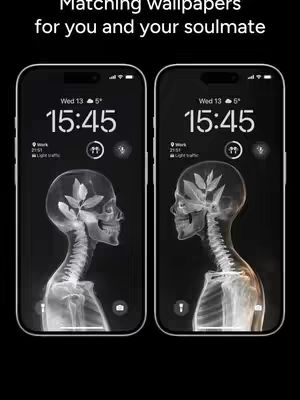 The cover image shows two smartphones side-by-side, each displaying a black lock screen wallpaper. The wallpaper design features an x-ray image of a human skull and neck. On each screen, the time 15:45 is prominently displayed. Above, white text reads 'Matching wallpapers for you and your soulmate'. The background is solid black.