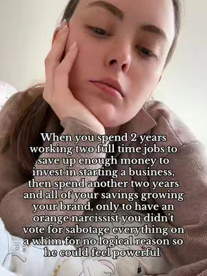 A woman with fair skin gazes pensively towards the lower left. She rests her head on her right hand, her elbow bent and her other arm out of view. The background is blurred, with soft lighting, and a light-colored top. Text is overlaid, starting with 'When you spend'.