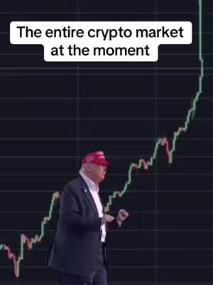 The cover image presents a meme-style depiction. The top of the image has a white rectangular text overlay that states "The entire crypto market at the moment". A chart representing a rising line over a black graph forms the background. In the foreground, former President Donald Trump is dancing with his arms and hands moving. He wears a red cap and suit.