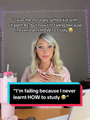 A woman with blonde hair and glasses is centered in the frame. She is looking towards the camera with a slight smile, hands clasped in front of her. A light pink top is worn. The background is a gradient of soft colors. On the bottom of the frame a text box is present, there is a pink tumbler and a few other items visible.