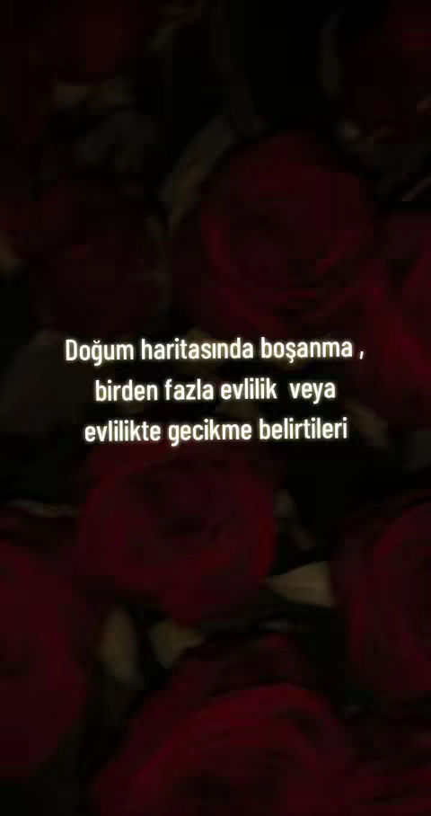 The image is a dark, close-up shot with a blurry background. The primary focus is on a cluster of deep red flowers, possibly roses, creating a sense of depth. White text is superimposed on the center, presenting information about the topic. The overall composition is moody and somewhat romantic, given the color palette and the subject matter.