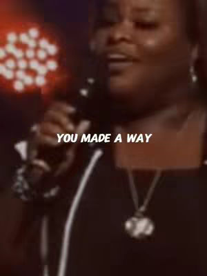 The cover image shows a woman with dark skin singing into a microphone. The background is dark and out of focus, with a bright light source to the left. The woman is wearing a dark outfit and a necklace. Text that says "YOU MADE A WAY" is overlaid on the image in white.