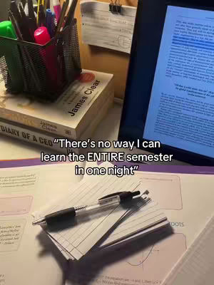 A desk scene with a stack of books, a pen in the foreground, and a laptop screen on the right displaying highlighted text. A pen holder with pens and markers is on the left. The overall composition is well-lit, and the colors are muted, creating a studious ambiance.