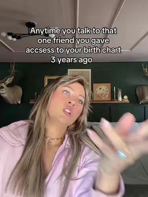 A woman with long blonde hair, wearing a pink top, is looking up and to the left, slightly smiling, with a hand raised in front of her. Text overlays the image.