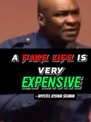 The cover image features a man speaking into a microphone. Overlayed on top is a black rectangle with the text 'A FAKE LIFE IS VERY EXPENSIVE' in bold, colorful fonts. Below this is '- APOSTLE JOSHUA SELMAN'. The man is wearing a blue shirt, and the background is a blurred interior.