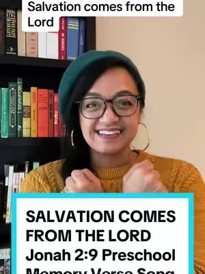 The cover image shows a smiling woman wearing glasses, a green beret, and a mustard-yellow sweater.  She is sitting in front of a bookshelf. A text overlay at the top reads 'Salvation comes from the Lord. ' A rectangular box at the bottom has a teal background with white text that reads 'SALVATION COMES FROM THE LORD Jonah 2:9 Preschool, Memory Verse Song'.