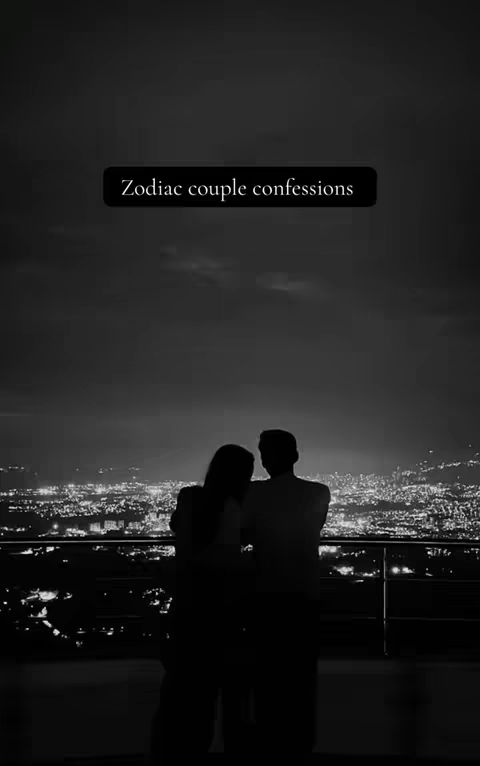 A grayscale image features two silhouetted figures standing on a balcony, overlooking a cityscape at night. The figures, presumably a couple, are seen from the back, with one person embracing the other, suggesting an intimate moment. Above them, a text overlay reads 'Zodiac couple confessions.' The background shows a sprawling city with lights, and the overall composition is dark and moody.