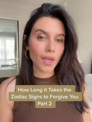A woman with dark hair and hoop earrings stands in front of a neutral background, speaking to the camera. A text overlay indicates the video's topic.