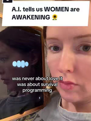 A selfie-style shot featuring a fair-skinned woman, with reddish hair, filling most of the frame from the shoulders up. She is looking to the right of the camera, with a neutral expression. Behind her, a dark tablet or phone screen reflects her face, and the text overlay includes the title "A.I. tells us WOMEN are AWAKENING" with a sunflower icon.