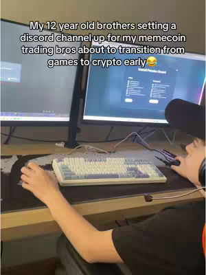The cover image shows a close-up of a person, likely a young male, sitting at a desk with two computer monitors in front of them. The person is hunched over a keyboard, with one hand on a mouse. The screens display what appears to be a Discord interface on the right monitor. Above the monitors is white text.