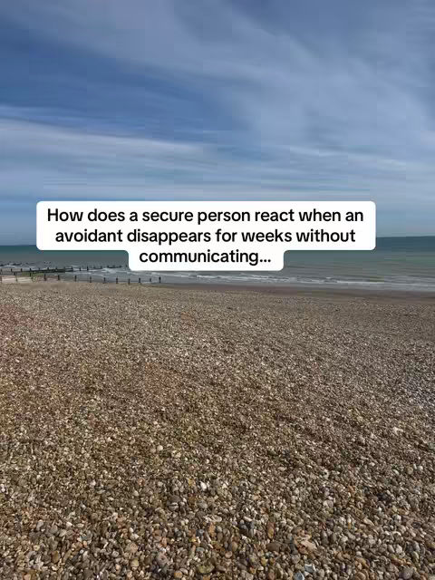 The image shows a coastal scene with a beach filled with pebbles. Above, there is a cloudy blue sky. A white text box is overlaid on the image containing the question: "How does a secure person react when an avoidant disappears for weeks without communicating..."