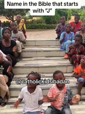 The image shows a group of diverse children sitting on outdoor steps. Above them, text reads "Name in the Bible that starts with 'J'". The children appear to be engaged, some looking directly at the camera, while others are interacting with each other. There's a sense of community and activity, as though they're part of a lesson or game.