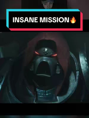 The cover image is a vertical video shot, likely a screenshot from a game. Dominated by a dark, imposing figure in a futuristic suit of armor with glowing red eyes. Above this figure, there is an overlay with text on a colored background.