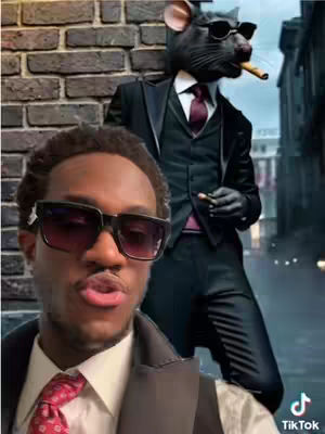 The cover image shows the creator in the foreground, partially visible and wearing sunglasses and a tailored suit. In the background is a hybrid figure of a rat with a human body wearing a suit and sunglasses, holding a cigar against a dim street background.