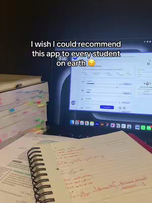 The cover image shows a laptop screen displaying an app interface, with a stack of books and a notebook in the foreground. The image is in a room lit by lamplight creating a study setting. A text overlay is added.