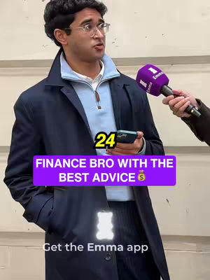 A man in a dark coat is being interviewed, holding a phone and facing the camera. A purple banner with white text overlay indicates the video's topic. A microphone with an Emma app logo is held in fromt of him