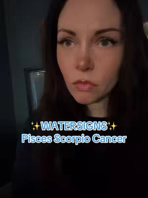 A woman with fair skin and long, dark hair is looking slightly to her left with a neutral expression. Text overlays in a blue gradient state “WATERSIGNS” and below, in a smaller font, “Pisces Scorpio Cancer”. The background is dark, hinting at a dimly lit interior.