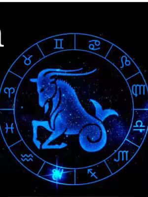 The cover image features a dark blue background with a circular design element in the center. Inside this element, there's a detailed illustration of a goat in shades of blue. Surrounding the goat is a ring containing zodiac symbols. The overall composition is symmetrical and visually oriented towards attracting attention.