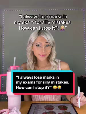A young woman is in a room with light reflected off the wall. She is smiling with glasses and long hair. There is a light up around the mirror behind her. She has a drink cup to the left of her. There is a digital pad on the table. The text overlaid on the image says, “I always lose marks in my exam for silly mistakes. How can I stop it?!”