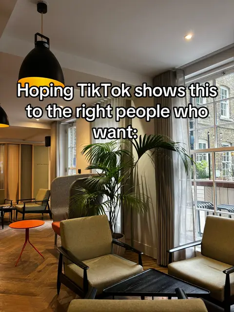 An interior shot of a lounge area with chairs, tables, and a large window. Text overlay indicates a request to TikTok.