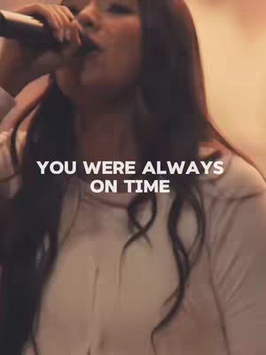 A woman is singing into a microphone. Black text over it says, YOU WERE ALWAYS ON TIME.