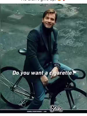 A man in a suit sits on a black bicycle, smiling. Text appears below the man saying, Do you want a cigarette?