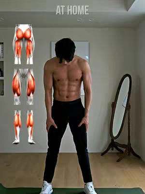 A man stands shirtless in a home workout setting, with multiple anatomical illustrations of leg muscles overlaid. The text overlay reads 'AT HOME'. A full-length mirror and a bookshelf are visible in the background.