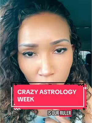 The cover image features a close-up of a woman's face, centered in the frame. She has dark, curly hair and is looking towards the camera with a serious expression. A red banner overlay with white text reading "CRAZY ASTROLOGY WEEK" and beneath it "IS OUR RULER" is placed, partially obscuring her face. The background is a muted, greenish-blue, possibly the inside of a vehicle. She has visible eyebrows and is wearing light makeup.