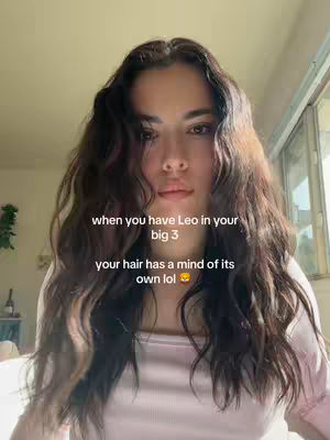 The cover image shows a woman with long wavy dark hair in a close-up shot. The lighting suggests a natural setting, potentially near a window, seen by the soft sunlight, with text overlayed. The woman is wearing a light-colored top, and the background is blurred.