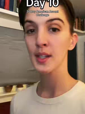 A selfie-style image of a person, likely a woman, from the chest up. The background includes a bookshelf and parts of a room. White text overlays on the top, indicating the video is part of a 30-day challenge. The person is looking at or speaking to the camera.