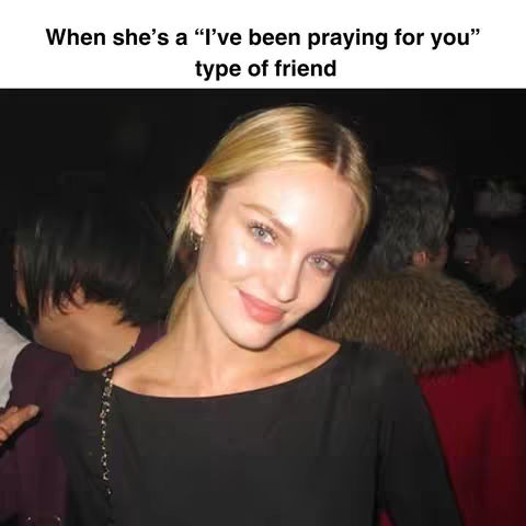 The cover image is a selfie of a woman with blonde hair and fair skin, smiling. The woman is wearing a black top, and the image is taken indoors with soft lighting. Behind her is another person. Text overlayed reads "When she's a 'I've been praying for you' type of friend."