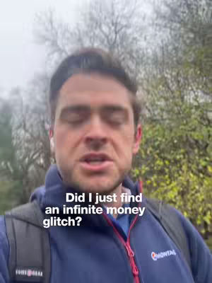 A medium shot shows a man looking directly at the camera with partially closed eyes. He's wearing a blue jacket with a red zipper. Overlayed on the image is white text asking, "Did I just find an infinite money glitch?" The background is a blurred mix of trees and a cloudy sky.