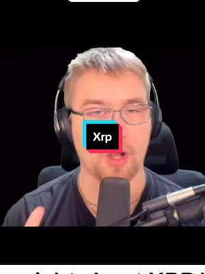 A man with glasses and a headset is centered in front of a dark background. A rectangular box reading 'Xrp' is superimposed over his face.