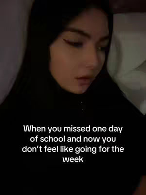 A close-up shot of a young woman with long, dark hair looking downcast. She's positioned against a muted background, possibly a bed or a wall. Overlay text is at the bottom.