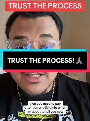 A man with glasses and a partially visible black shirt is looking at the camera while the text overlaying the scene states "TRUST THE PROCESS!" and trust the process at the top of the image. There's a gold necklace and a comment at bottom.
