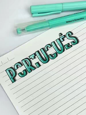 An image featuring a notebook page with a title 'PORTUGUÊS' written in a stylized font, along with two teal pens. The title is in the center of the page, appearing to be 3D with a black outline that giving the look of a 3D style. The angle of the shot is from above, with the pens positioned in a way to suggest they're used for the lettering. The color scheme is mainly teal against white, with black highlights that add depth to the text.