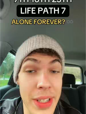 A selfie-style video cover featuring a young man in a gray beanie from the chest up, positioned inside a car. Text overlays at the top read '9TH 18TH 23TH' in white, and below is 'LIFE PATH 7' in black. Below this in a yellow banner, the text reads 'ALONE FOREVER?' The man is looking at the camera with a slight smile and red lips, appearing to be speaking in the video.