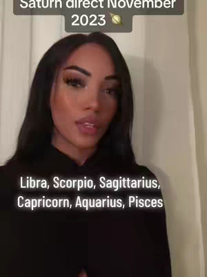 A young woman with long dark hair and makeup is centered in the frame, positioned against a neutral background. Above her, text overlays read 'Saturn direct November 2023' and a list of zodiac signs appears below.