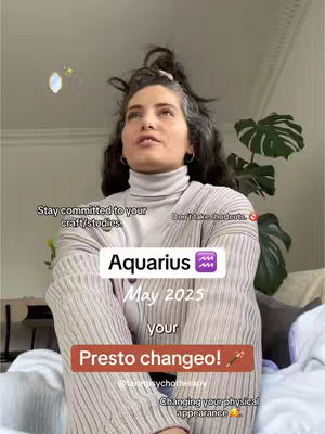 A woman with dark wavy hair and a partially visible gray streak sits indoors in a sweater, looking upward. Text boxes overlay the image, including the words "Aquarius" and "Presto changeo!"