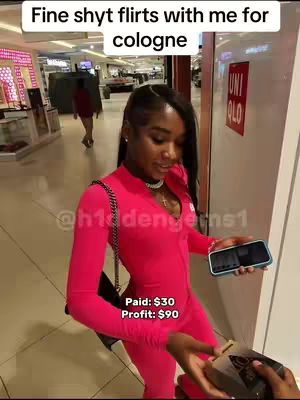 A woman in a bright pink jumpsuit stands in what appears to be a retail store, holding a phone. Text overlays state pricing information and a hook about reselling.',