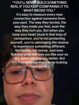 A close-up shot of a man wearing glasses, looking towards the camera. The background is dark. Overlaid onto the image is white text with a black background.