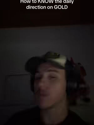 The cover image shows a man in a dark room with the upper text saying How to KNOW the daily direction on GOLD, the man has a cap and headphones.