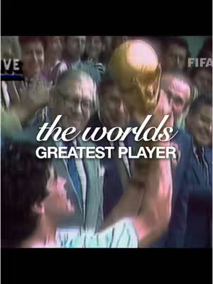 The cover image captures a moment of celebration. A crowd of people, mostly men in suits, are in the background, with the focus on a man holding the World Cup trophy aloft. Overlayed in a stylized white font are the words “the worlds GREATEST PLAYER”. The overall palette is muted and reminiscent of film from the 80s.