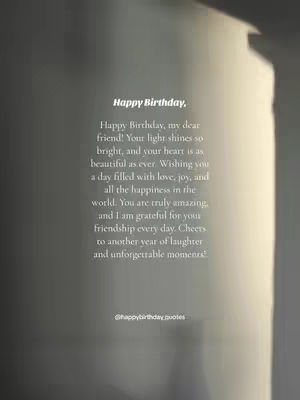 A vertical image featuring a soft, blurred background with layered text. The top right is brighter, suggesting a light source. The text, centrally aligned, contains a birthday message followed by a social media handle.