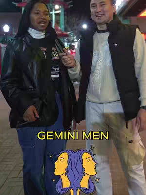 A cover image of a street interview featuring two people, a Black woman wearing a leather jacket and another man on the right. The woman is gesturing with her hand and appears to be talking. Behind them is city setting during nighttime. The cover also features the text overlay and astrology-themed iconography.