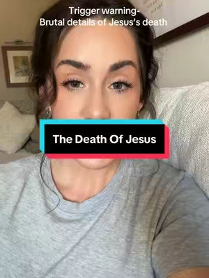 A woman with dark hair looks straight at the camera. The image is close-up, focusing on her face. A text overlay that reads "The Death Of Jesus" obscured the area under her nose. Above her head is text warning that the content will include brutal details.