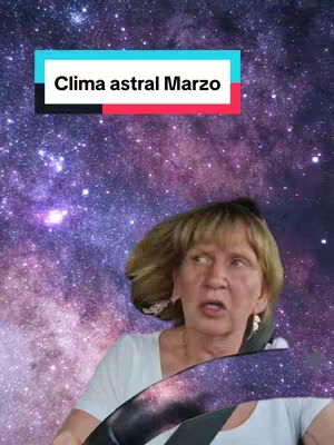 The cover image displays an older woman at the wheel of a car, with a cosmic background, and a text overlay. The background is a vibrant mix of purple and blue hues, suggestive of a galaxy or outer space. The text overlay, placed above the woman's head, includes the words 'Clima astral Marzo' in a rectangular shape with a black base and cyan text, topped by a red border. The woman has blonde hair, is looking towards the left side, and her facial expression shows an open mouth. She wears a white t-shirt and a seatbelt is visible across her chest; the car steering wheel creates a semi-circular frame in the immediate foreground.