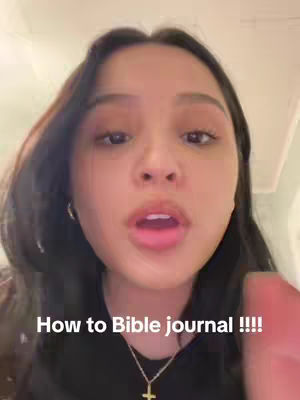 The cover image features a young woman in a close-up shot, appearing to be speaking directly to the camera. She has dark hair and is wearing a necklace with a cross pendant. The text overlay reads, 'How to Bible journal !!!!'. The background is out of focus, likely a room.